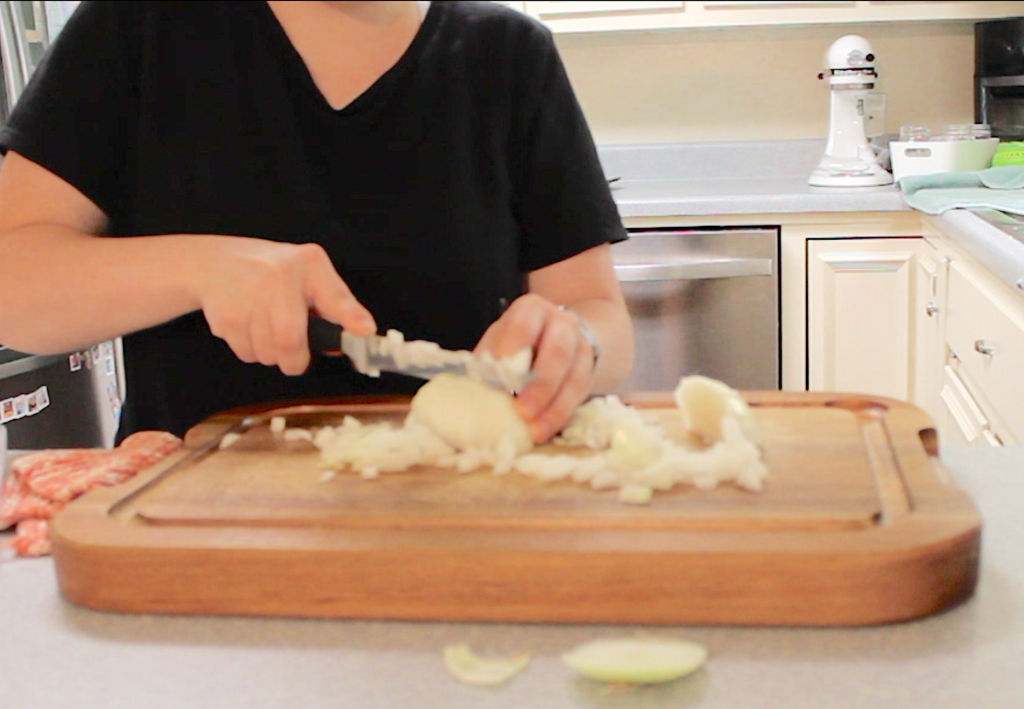 dicing onions on chopping board
