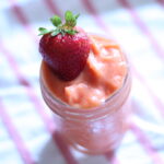 strawberry fruit on top of smoothie