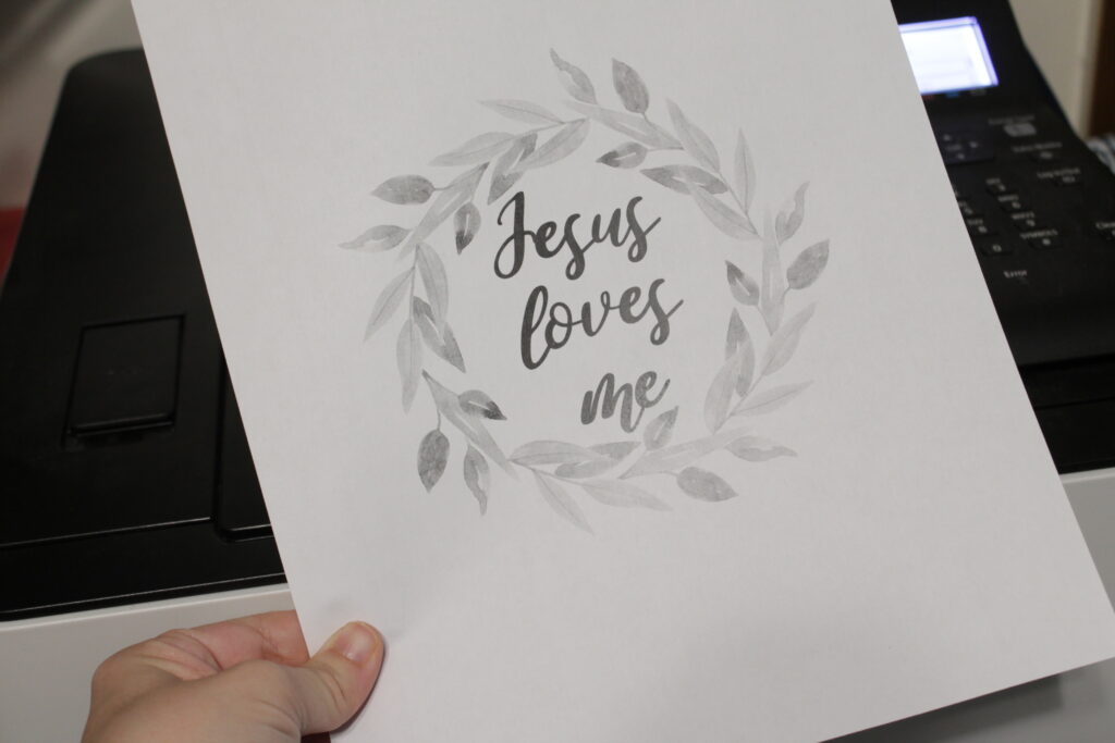 Jesus loves me printed in black and white
