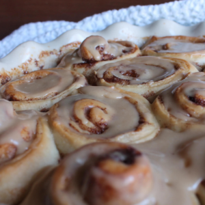 cinnamon rolls with icing up close