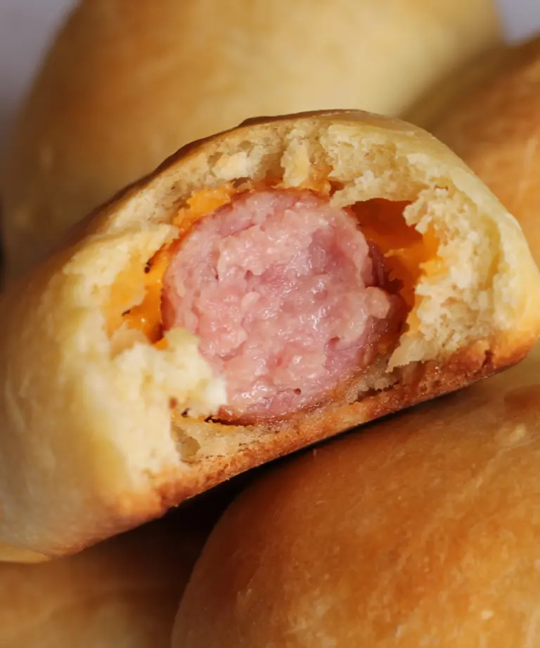 up close of the inside of a kolache wrapped in potato flake sourdough