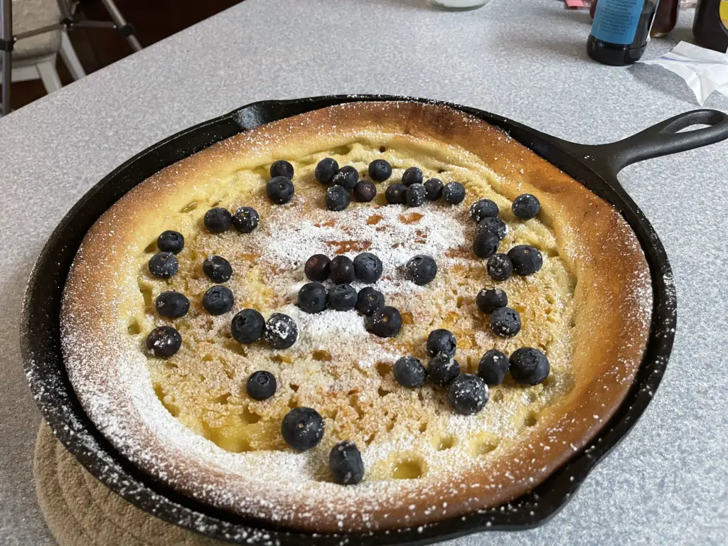 finished dutch baby with blueberries
