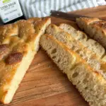 sliced potato flake sourdough focaccia on cutting board
