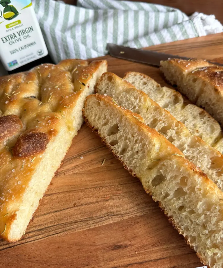 sliced potato flake sourdough focaccia on cutting board