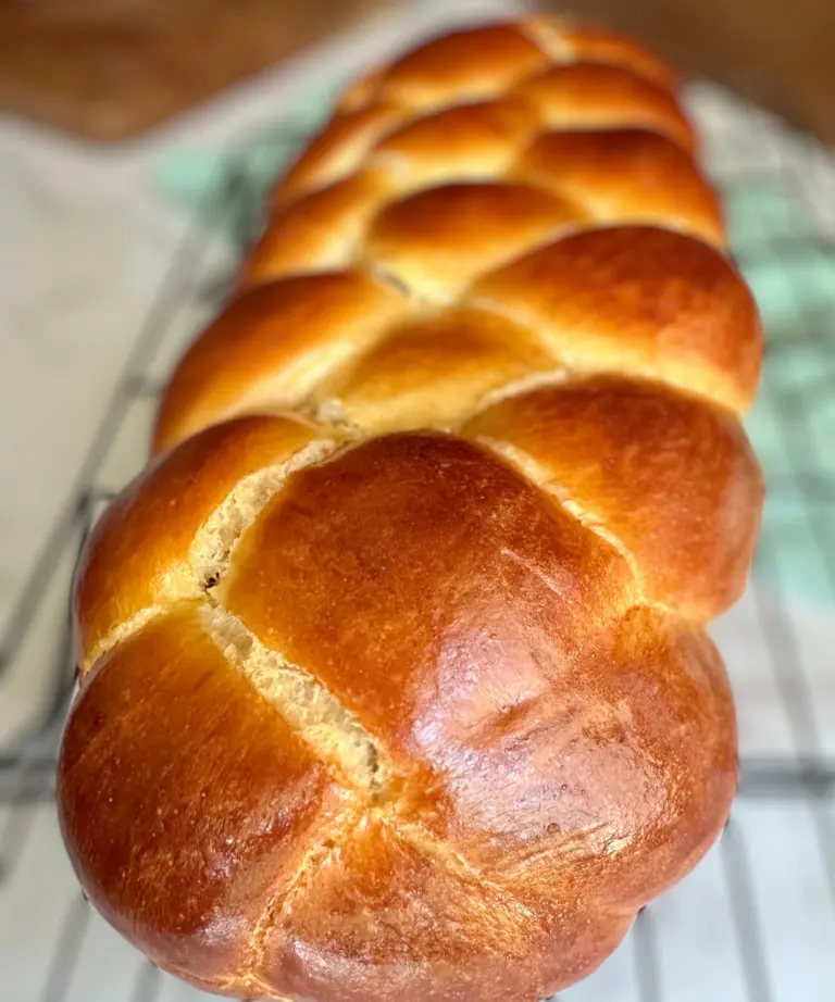 potato flake sourdough challah bread on cooling rack