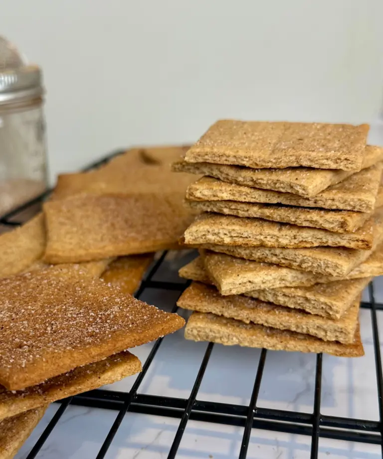 stack of homemade graham crackers on cooling rack