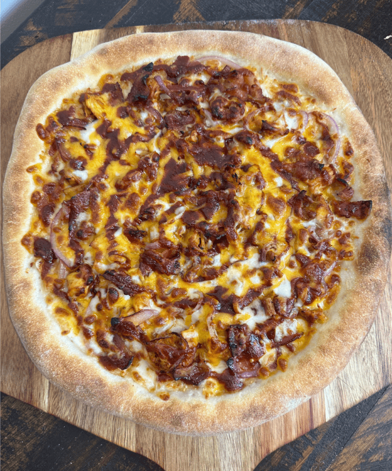 BBQ Chicken Bacon Pizza on pizza peel